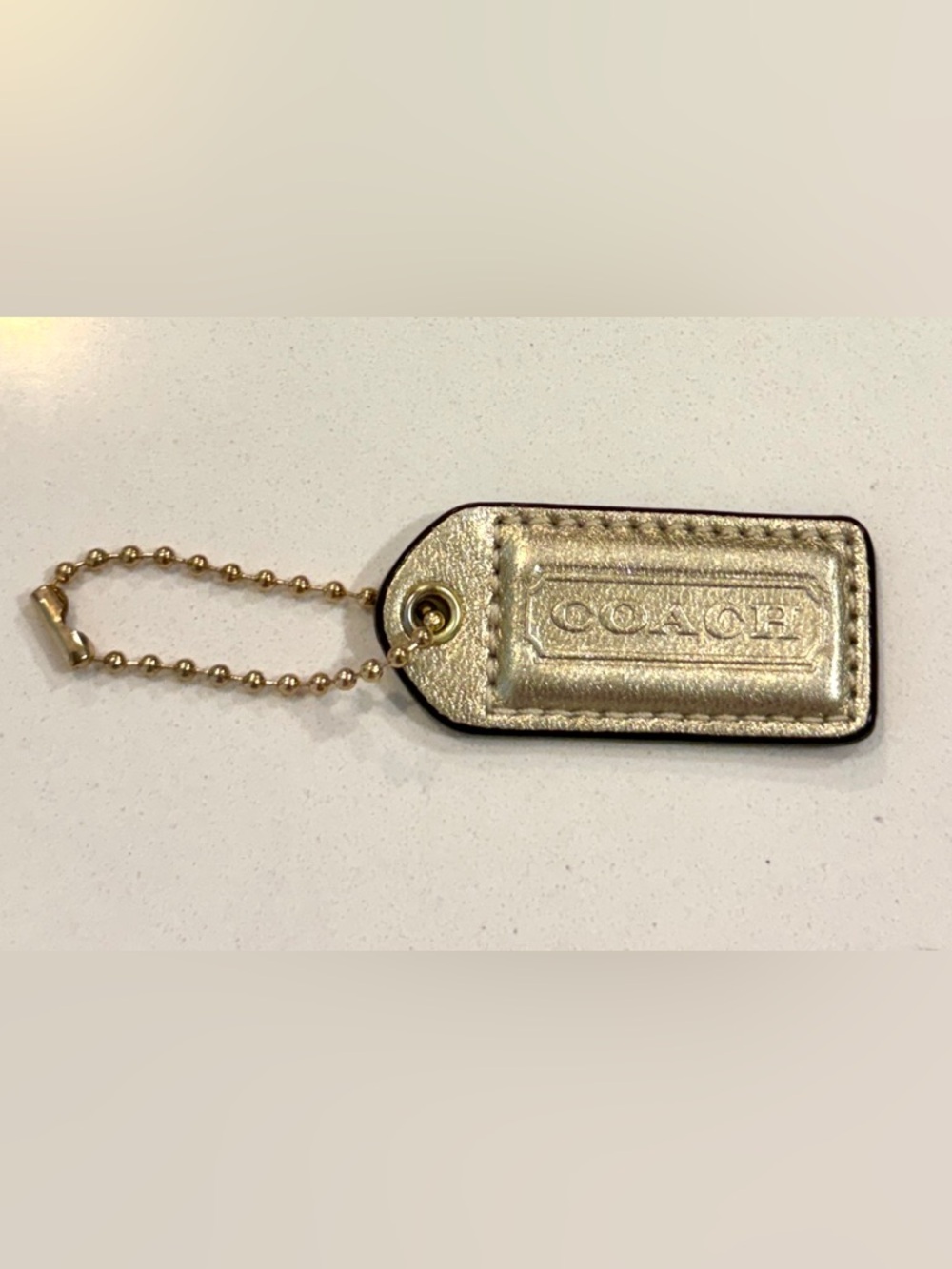 COACH Metallic Gold Leather Bag Hang Tag